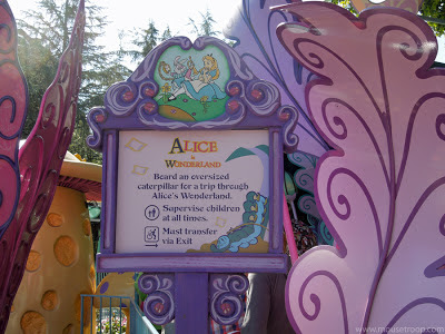 Alice Wonderland Disneyland dark ride sign signage leaves