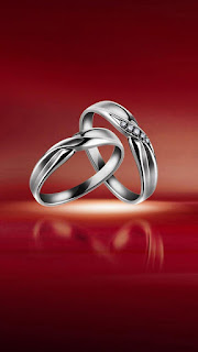 romantic love two rings mobile screen wallpaper. lovely wallpaper suitable for engagement and love relationship status