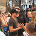 2010-07-21 Candid: Adam Lambert Signing Autographs Before the Concert-Portland, OR