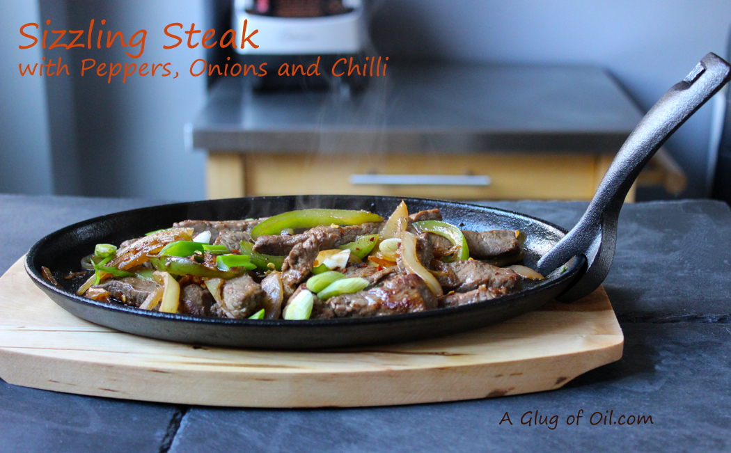 Sizzle steak recipe with peppers and onions.