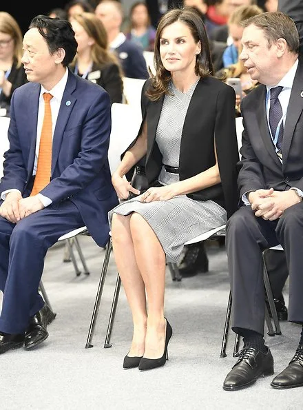 Queen Letizia wore Hugo Boss Dechesta glen check stretch cut cap sleeve sheath dress, and Zara cape style jacket