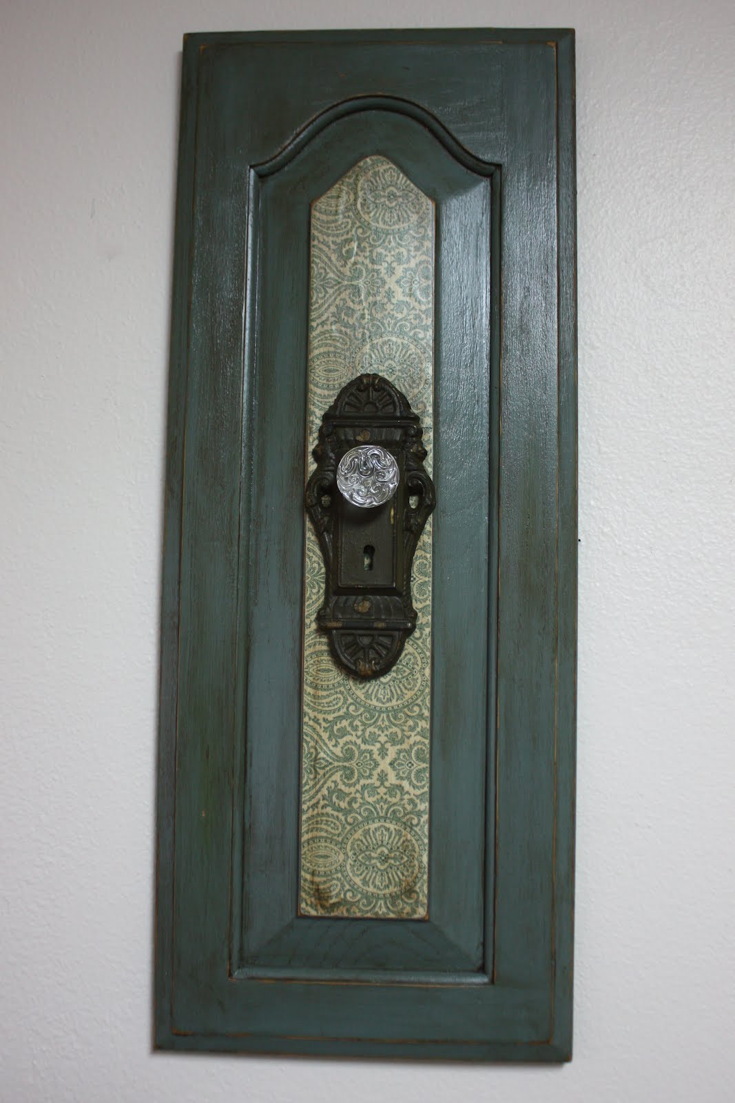 At Home: Green Wall Hanging with Antique Door Knob