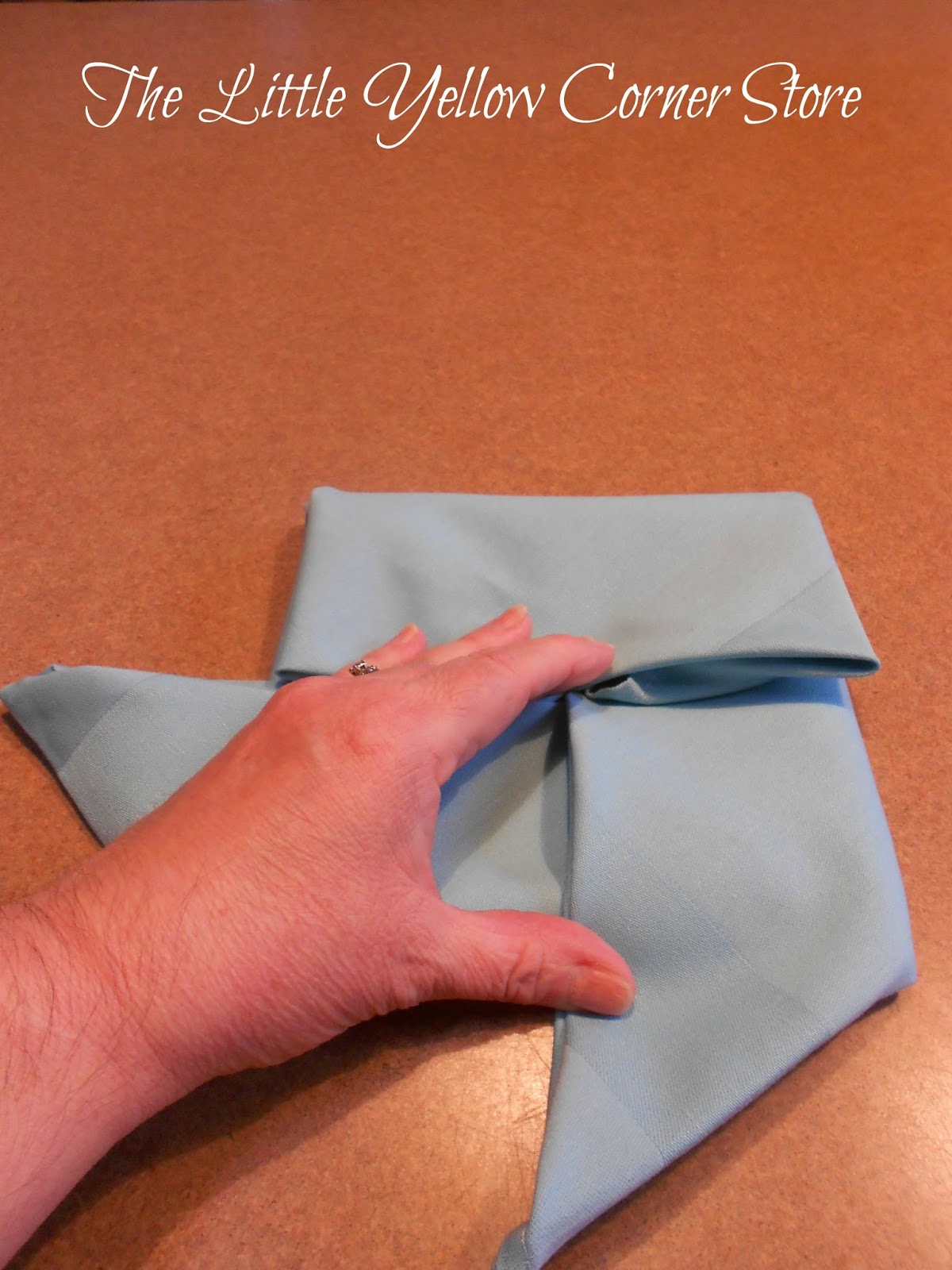 The Little Yellow Corner Store Summer Time Pinwheel Napkin Fold