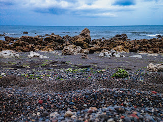 Sand And Chunks Of Coral Reefs On The Beach At Umeanyar Village, North Bali, Indonesia