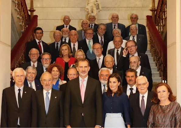 Queen Letizia wore Hugo Boss high waisted pencil skirt same worn Crown Princess Mary,, and Carolina Herrera navy shirt, and Magrit pumps