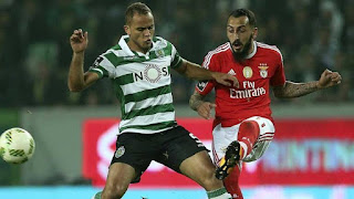 Quem ri por último, ri melhor; Benfica de Vitória quebra jejum nos Clássicos e já é líder; Sporting dominou na 2.ª parte mas vai ficar a chorar o desperdício de Ruiz; Lindelof esteve imperial na defesa; Ausência de Júlio César não se fez sentir; Slimani voltou a estar escondido; Patrício quase não foi testado; Jonas (que fez a diferença na 1.ª parte) vai terminar a época sem marcar aos grandes