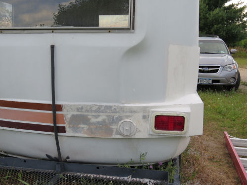 stripping paint on a fiberglass trailer