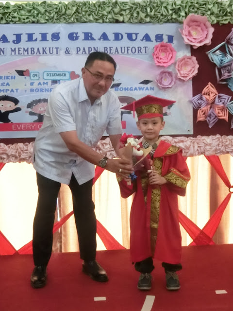 lil' Iman on his playschool convocation day