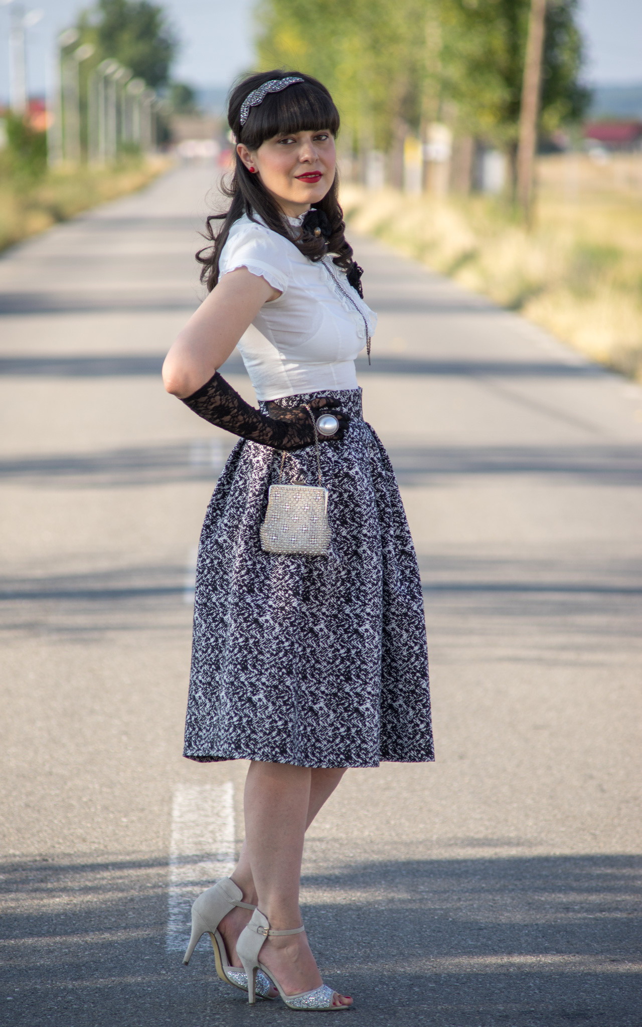 retro black and white wedding attire 50s puffy skirt black lace gloves white victorian shirt beaded vintage purse beaded sandals beaded hair piece vintage like lace brooch