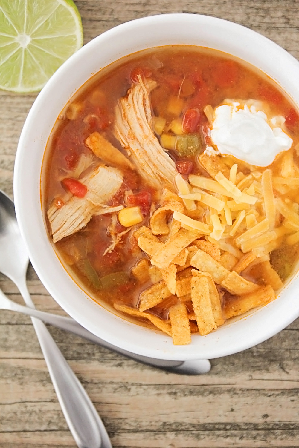 This Instant Pot chicken tortilla soup is incredibly flavorful, and has just a thirty minute cook time! A savory and delicious dinner that's perfect for a busy night. 