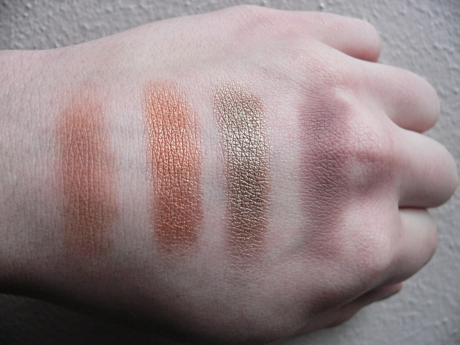 MAC Eye Shadow Swatches: (Left to Right) "Bamboo", "Amber Lights", "Sumptuous Olive", "Quarry"