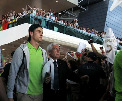 Cristiano Ronaldo returns to Portugal after Euro 2012