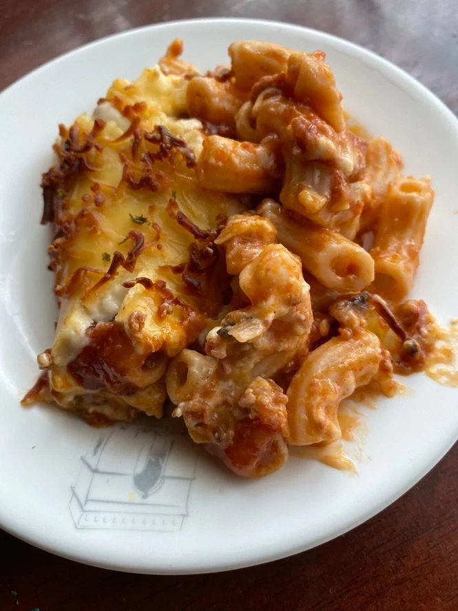 A plate of cheesy baked beef macaroni from Marcela's Something Baked