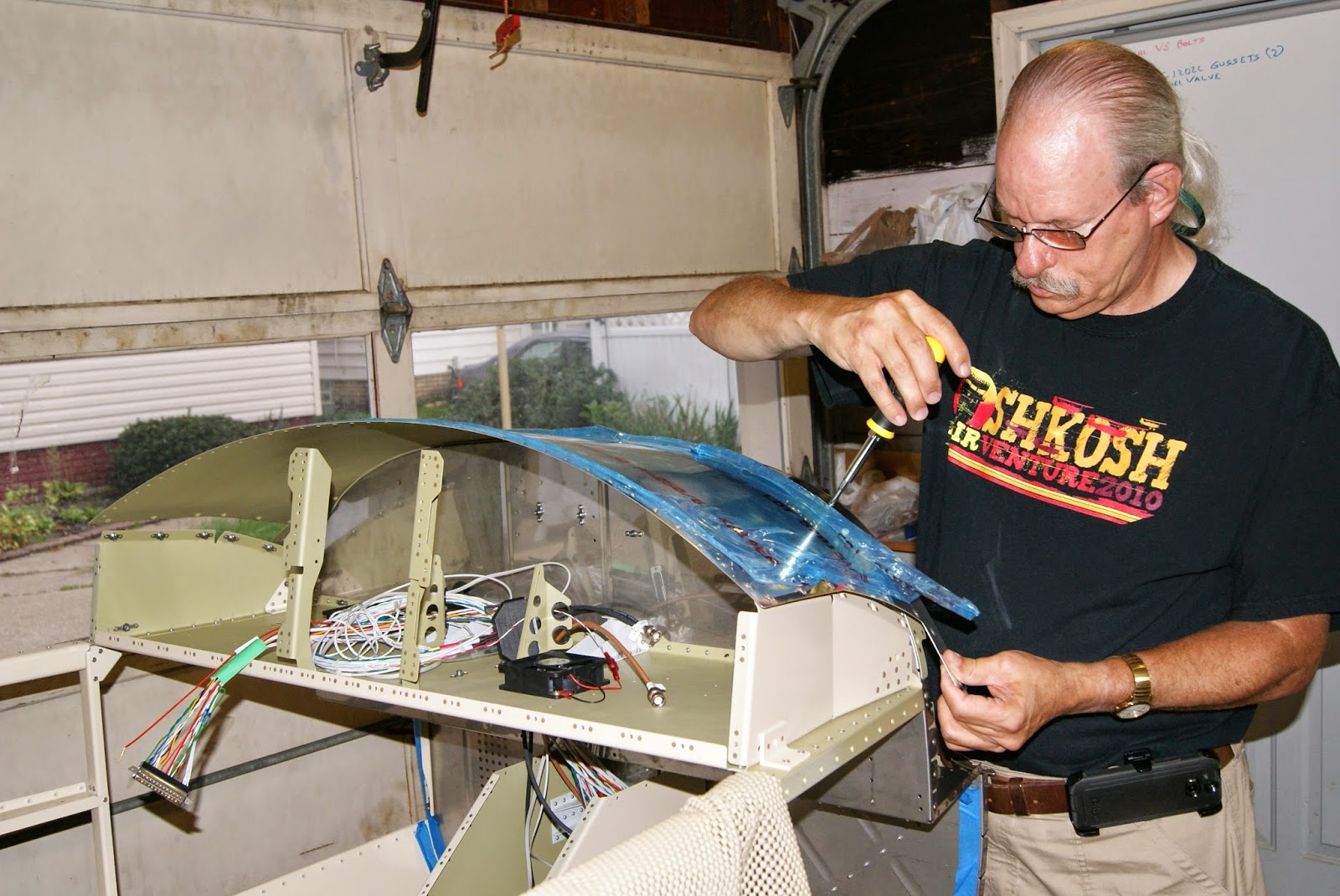 DOG Aviation John's RV-12 Blog: Forward Upper Fuselage Skin Set in Place