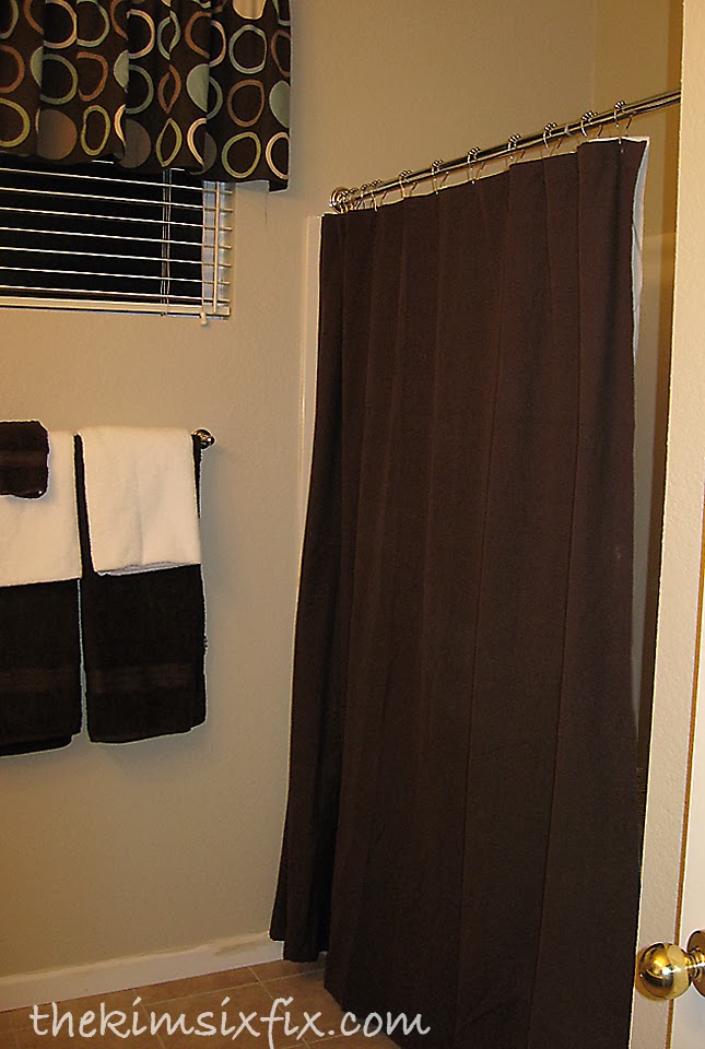 After filling the holes, all that is left to do is hang a curtain rod