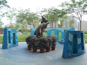 sculpture of dolphins in Tsuen Wan Park in Hong Kong
