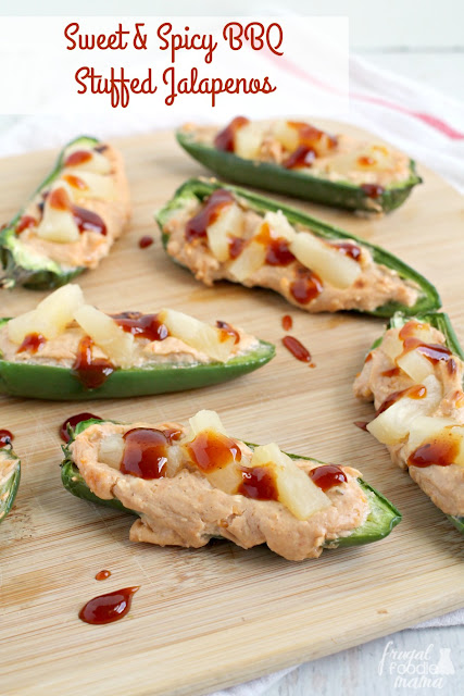 Stuffed with a creamy cheese filling and topped with sweet pineapple, these Sweet & Spicy BBQ Stuffed Jalapenos are the perfect way to start your backyard barbecue.