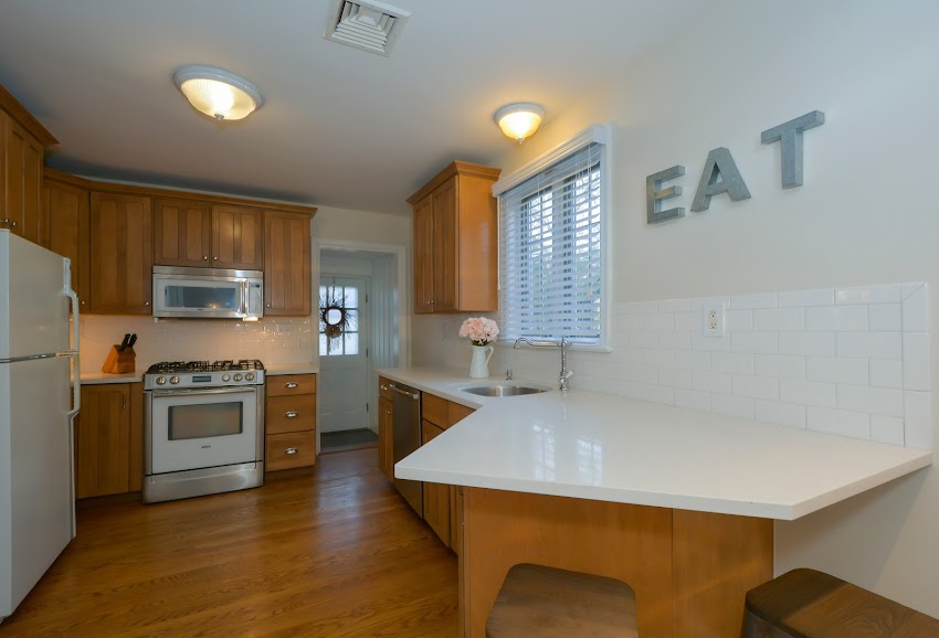 White Wooden Table in the Kitchen White Wooden Table in the Kitchen