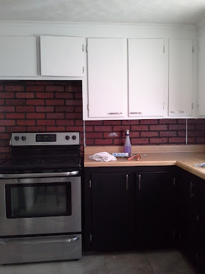 white black tuxedo kitchen painted faux brick