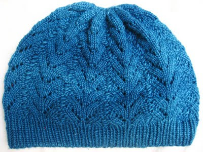 http://buttonsandbeeswax.com/patterns/hat-patterns/nordic-lace-hat/