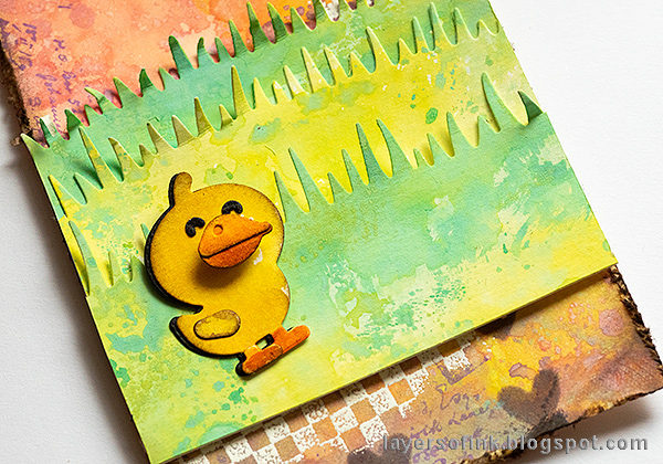 Layers of ink - Pastel Easter Tag Tutorial by Anna-Karin Evaldsson. Assemble the grass.