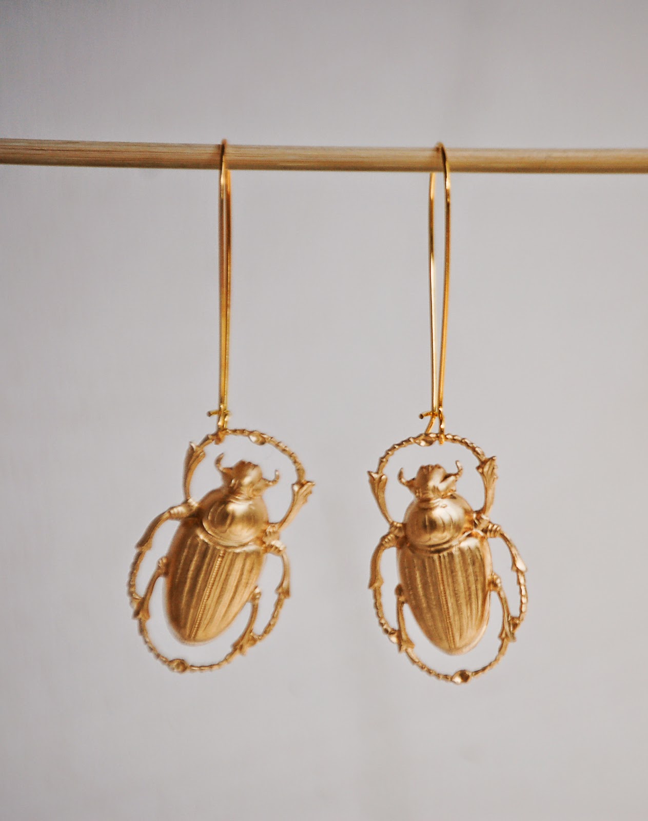 https://www.etsy.com/listing/226803713/gold-beetle-earrings-nature-study?ref=shop_home_active_2&ga_search_query=beetle