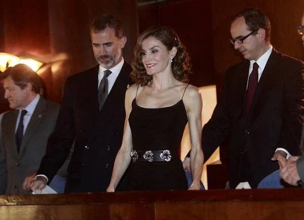 Queen Letizia wore Hugo Boss Capina wool cape, Prada Toe Pump, Felpe Varela drees and Clutch bag