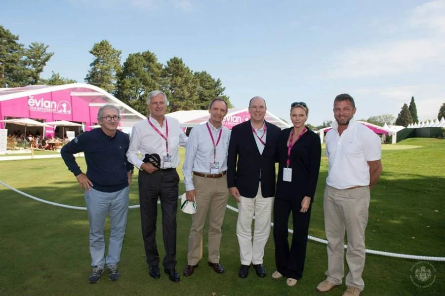 Princess Charlene and Prince Albert with (left to right) Franck Riboud, President of the Evian Championship and CEO of Danone, Vice-President of the European Commission Michel Barnier, former French ski racer Jean Claude Killy and Evian tournament director Jacques Bungert.