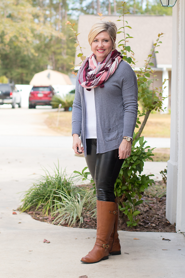 grey cardigan and faux leather leggings