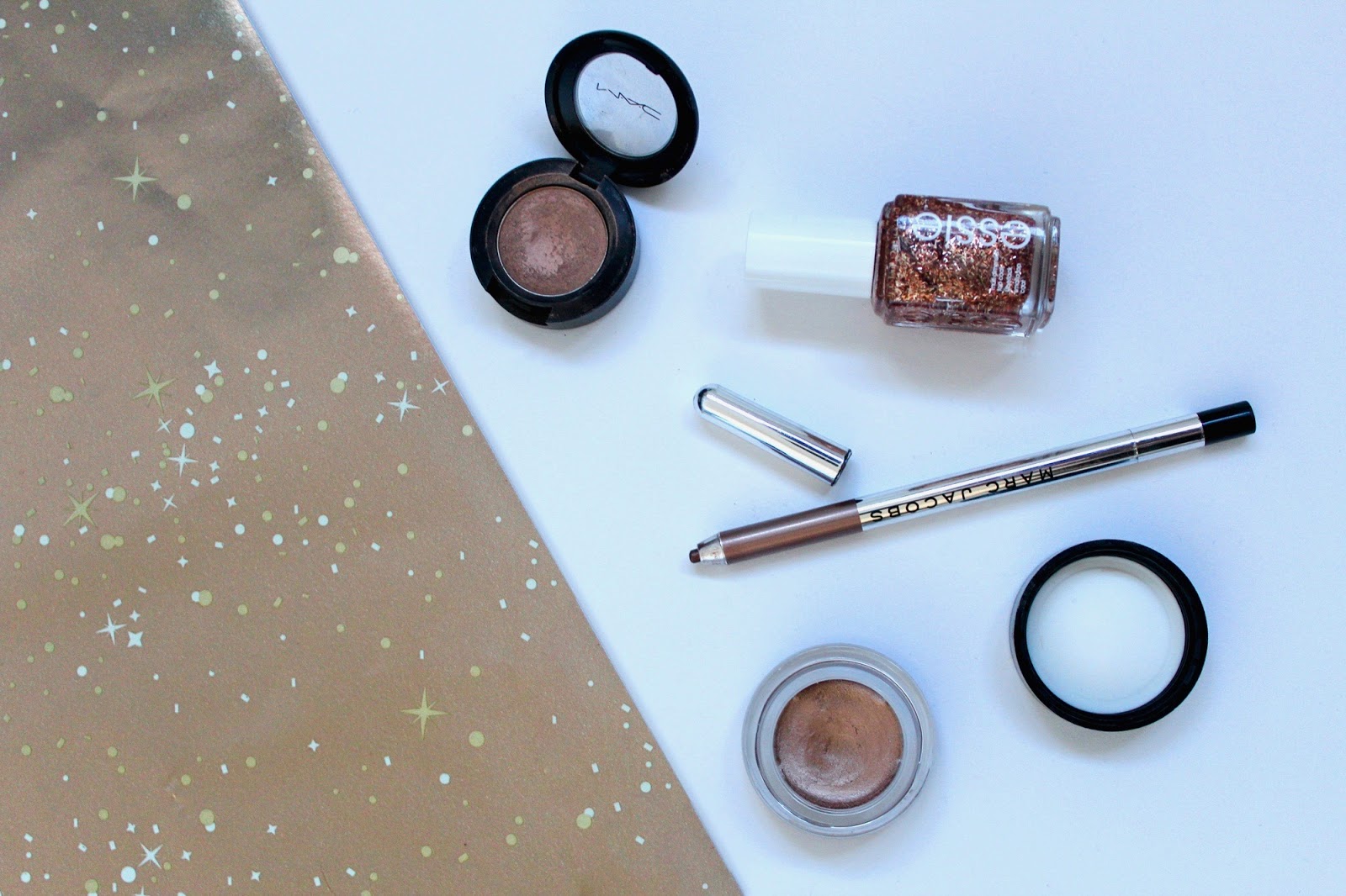 beauty makeup glitter mac all that glitters eyeshadow maybelline color tatto eye cream on and on brozne marc jacobs eyeliner rococoa essie tassle shaker nail polish varnish bblogger bbloggers flatlay instagram kirstie pickering christmas festive new years eve look