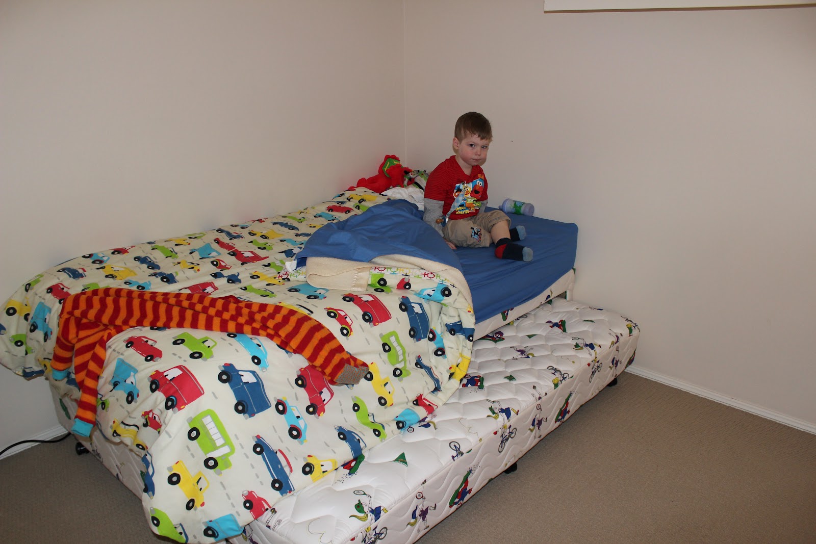 life with 3 under 3 little boy in a big bed