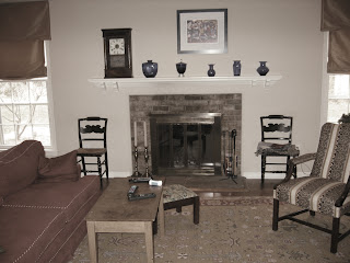 Photo of living room fireplace before renovation by Studio Santalla