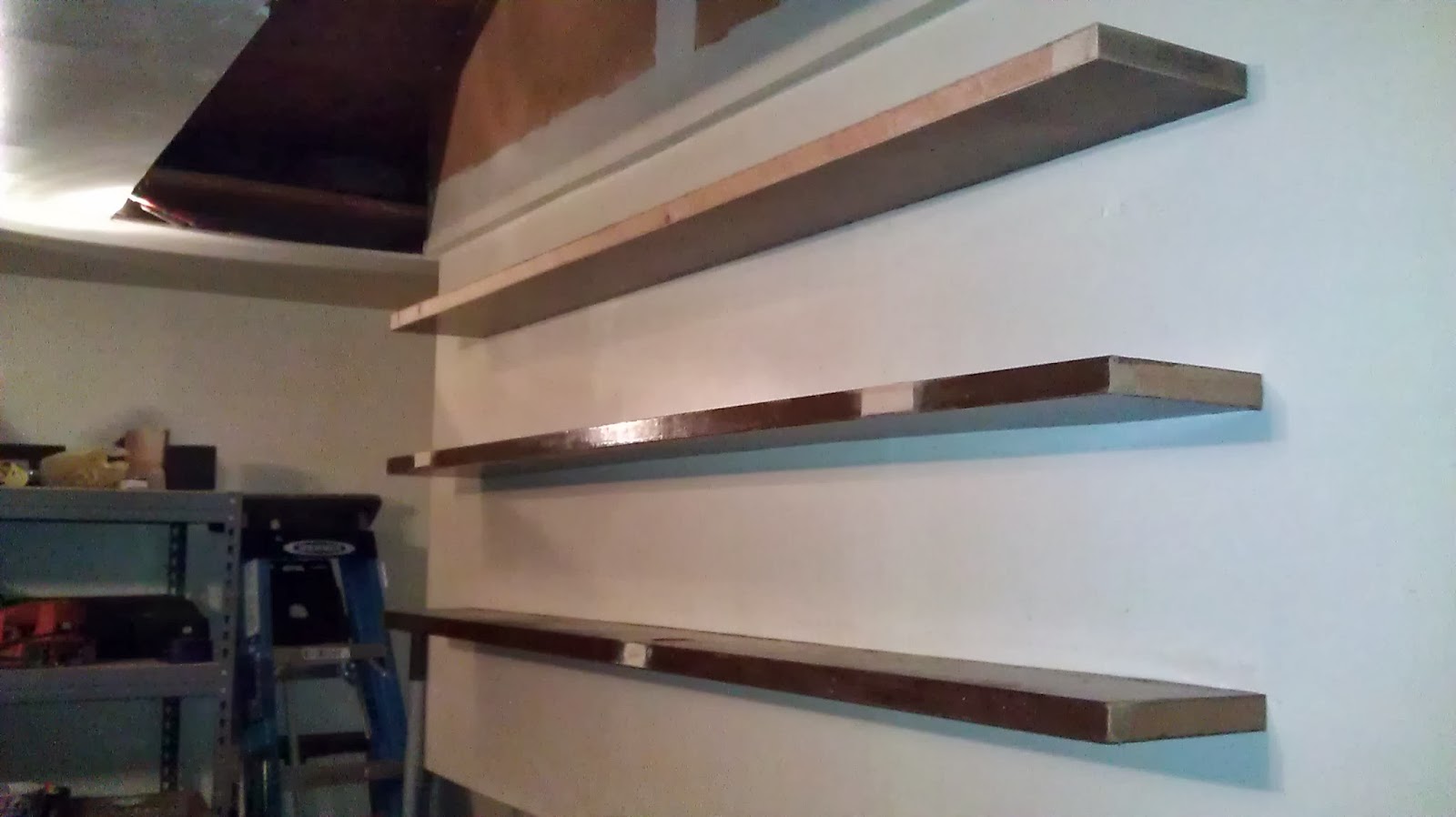 The Amos School of Construction The Floating Garage Shelves