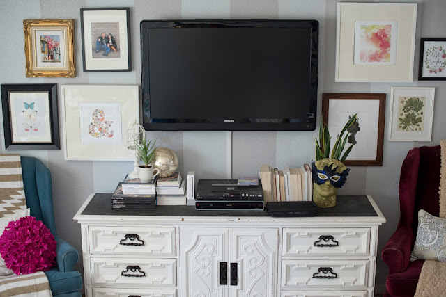 Create a gallery wall to decorate around your TV