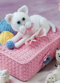 http://www.ravelry.com/patterns/library/cat--ball-tissue-cover