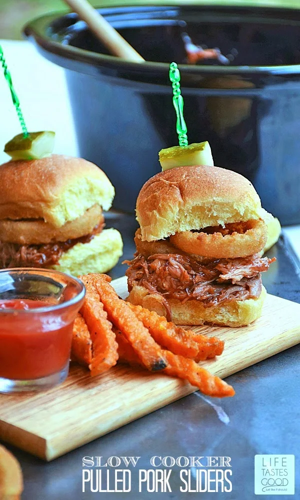 Slow Cooker Pulled Pork Sliders have the goodness of fork tender, juicy pork smothered in sweet and tangy barbecue sauce and topped with crispy golden onion rings for a nice crunch and great taste in every bite.