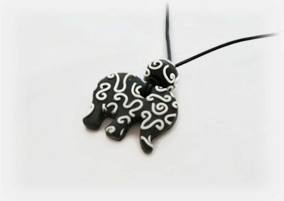 Monochrome Filigree Elephant Pendant handmade from polymer clay by Lottie Of London