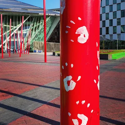 One day in Dublin: Handprints on a pole in Grand Canal Square