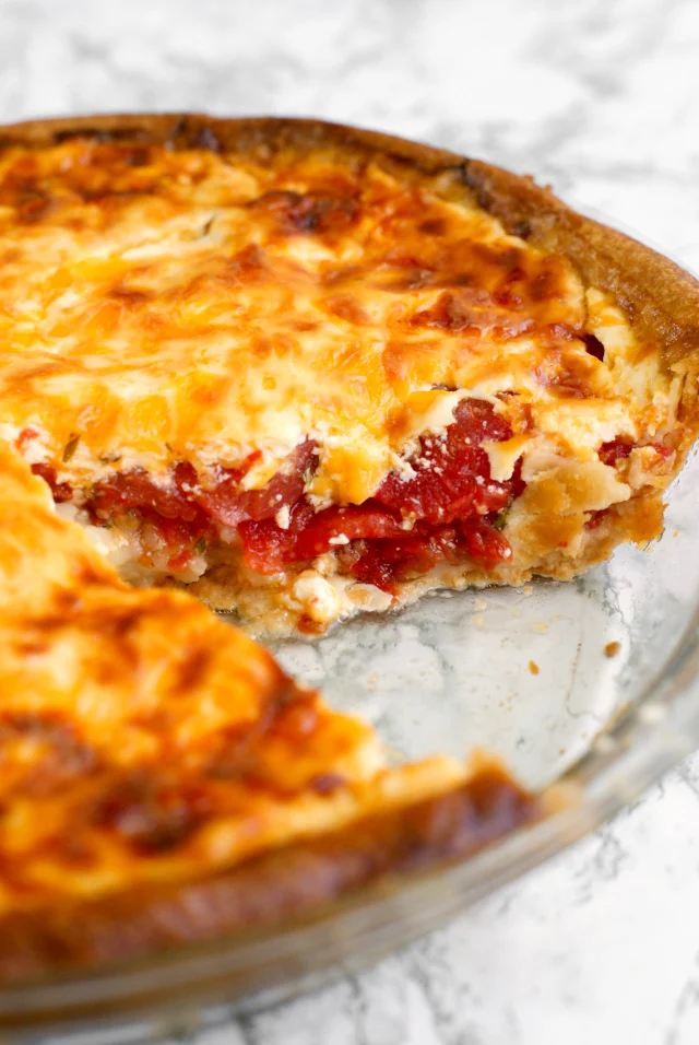 Tomato Pie features fresh Jersey tomatoes, greek yogurt, and sharp cheddar cheese.