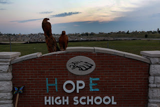 Joplin high school sign with missing letters replaced with tape to spell hope