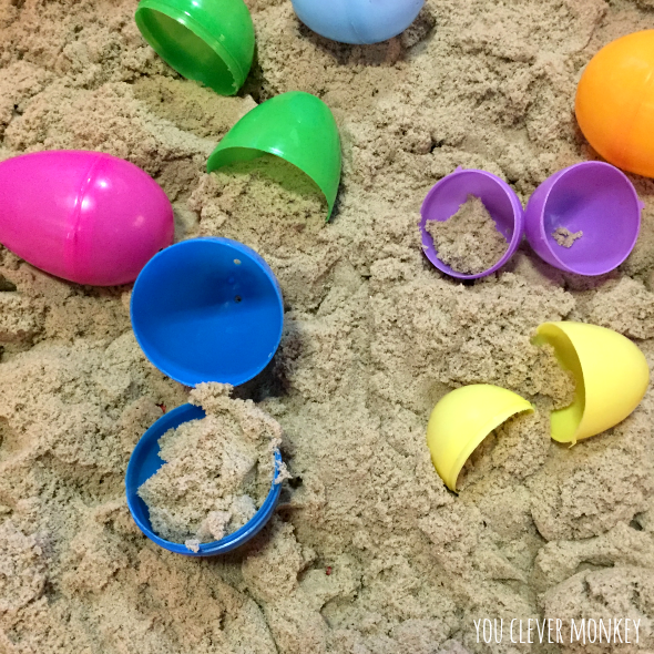 Easter Eggs and Kinetic Sand - create this simple sensory rich invitation to play and be amazed at the opportunity it creates to learn about 3D shapes during play | you clever monkey 