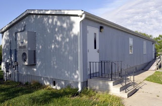 24' x 40' modular classrooms are used for 20 students and a teacher.