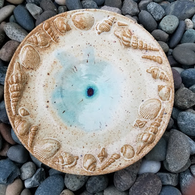 Beautiful seashell / beach themed pedestal plate by Tiger Lily Pottery.