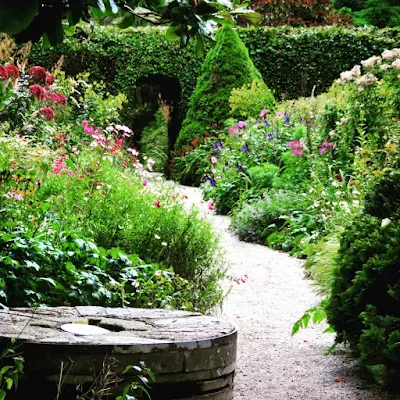 Walled Garden and millstone at Mount Usher Gardens in County Wicklow