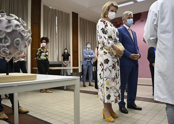 The Institute of Tropical Medicine, HM calf-length dress, Valentino floral print belted dress, Carolina Herrera floral midi dress