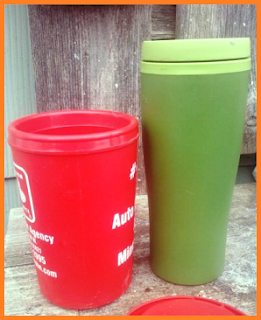 Two thermal mugs: Red 16 ounce mug with handle on left and green 18 ounce mug on right.