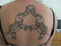 Feminine Elephant Head Tattoo With Flowers