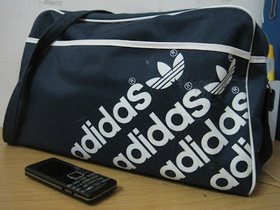 c a p t a i n s t o r e: vintage adidas sling bag (SOLD)