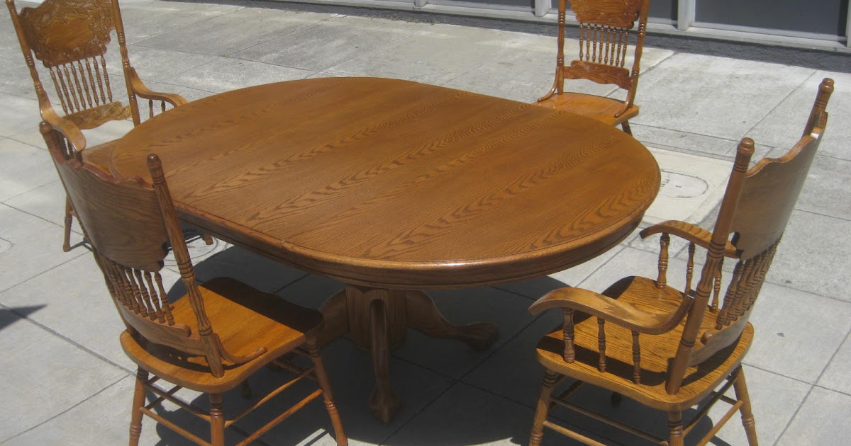 UHURU FURNITURE & COLLECTIBLES: SOLD - Oak Pedestal Dining Table + Leaf