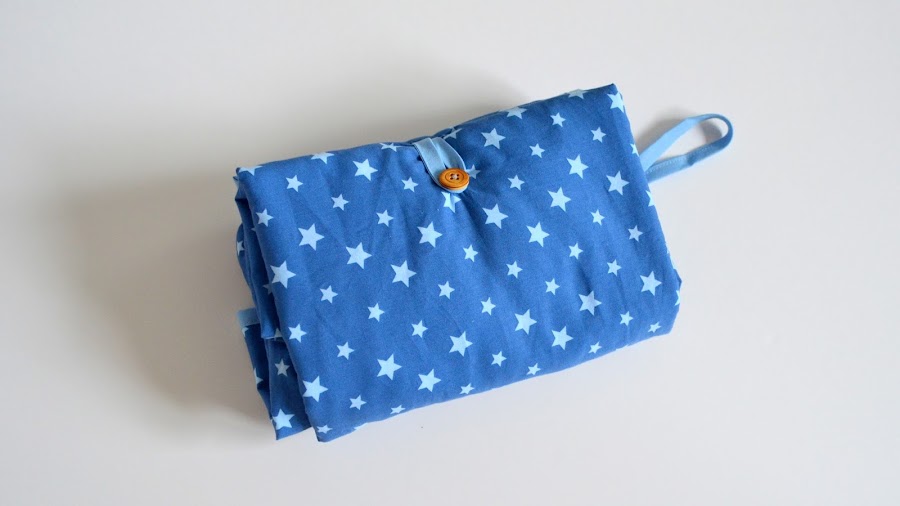 cambiador de viaje con bolsillos